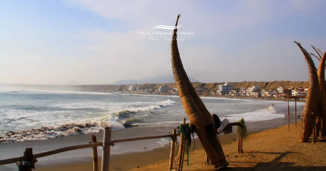 Huanchaco beach near Trujillo, Peru, with traditional caballitos de totora boats along the Pacific coastline