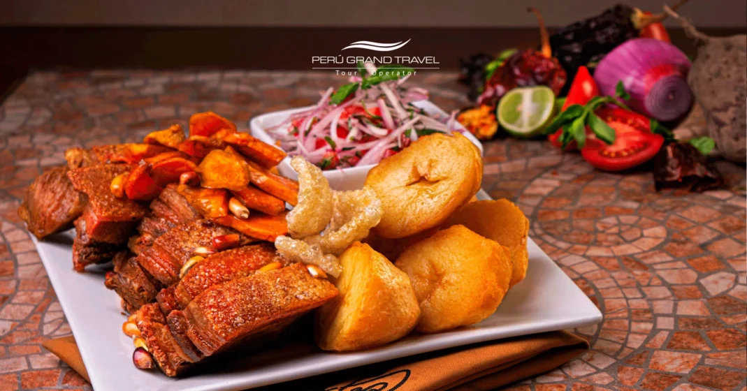 Peruvian food dish, chicharron with potatoes, chicharron de saylla, fried pork, traditional pork dish from Peru