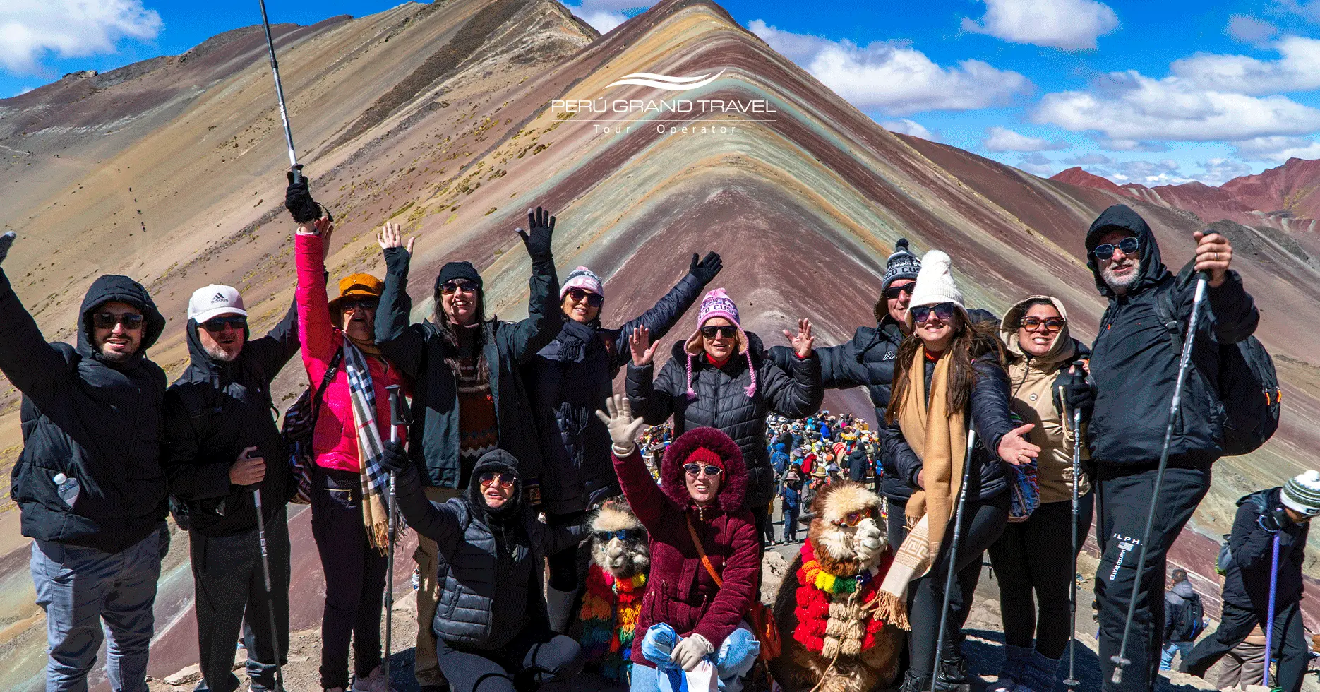 Rainbow Mountain group enjoying a tour with Peru Grand Travel