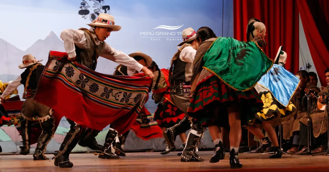 Traditional dancers performing on stage at the Centro Qosqo de Arte Nativo