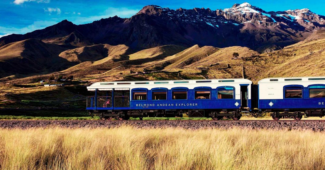 Luxury trip to Peru on the Belmond Andean Explorer through the three cities of Cusco, Puno, and Arequipa, with views of the Andes and snow-capped peaks.