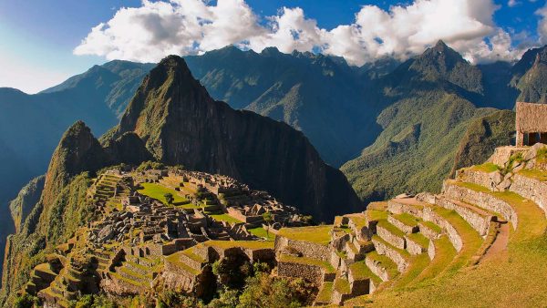 Panoramic view of Machu Picchu with the platforms and the guardian's house - machu picchu luxury tours