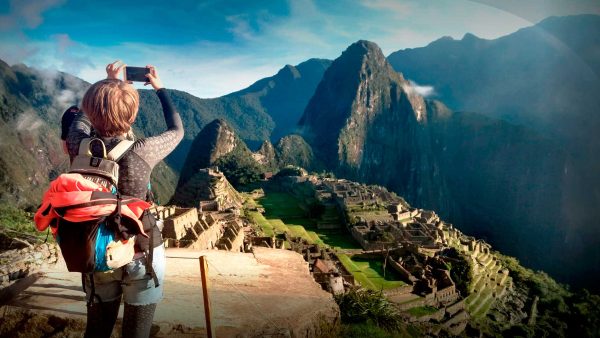Tourism in Peru - Machu Picchu with a view of the buildings and the surrounding mountains