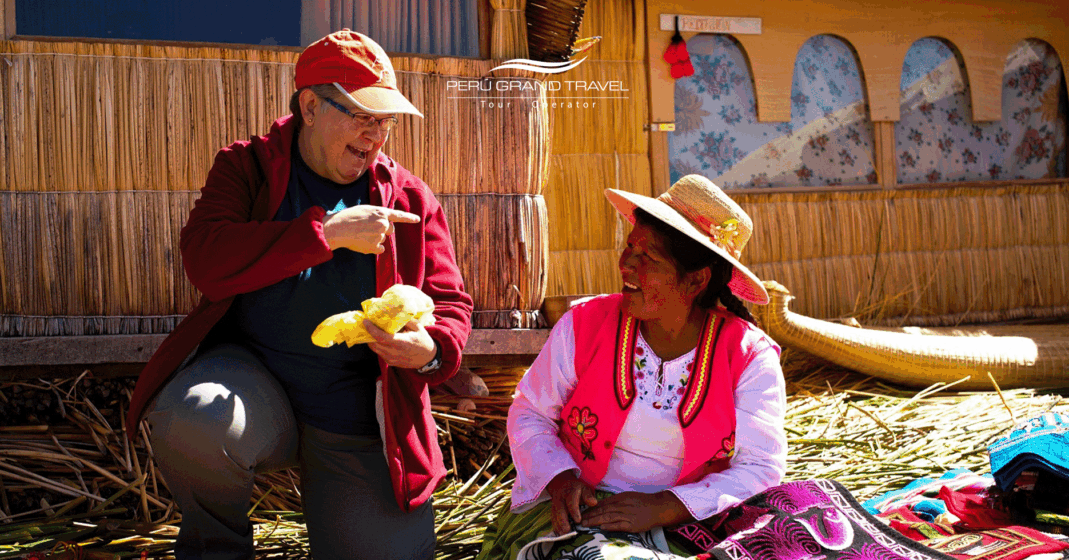 tourist with a woman from the Peruvian community