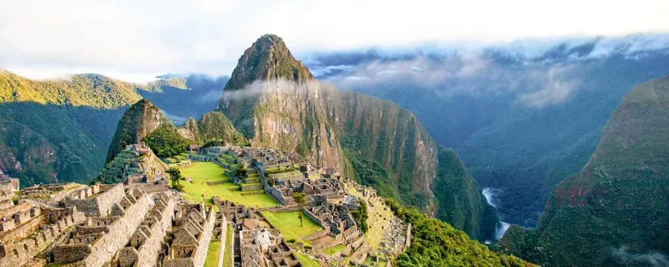 Machu Picchu: Experience the Ultimate Inca Wonder Magnificent panoramic view of Machu Picchu and its iconic ancient stone terraces.