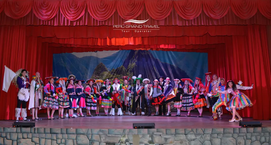 Full traditional dance ensemble performing at the Centro Qosqo de Arte Nativo
