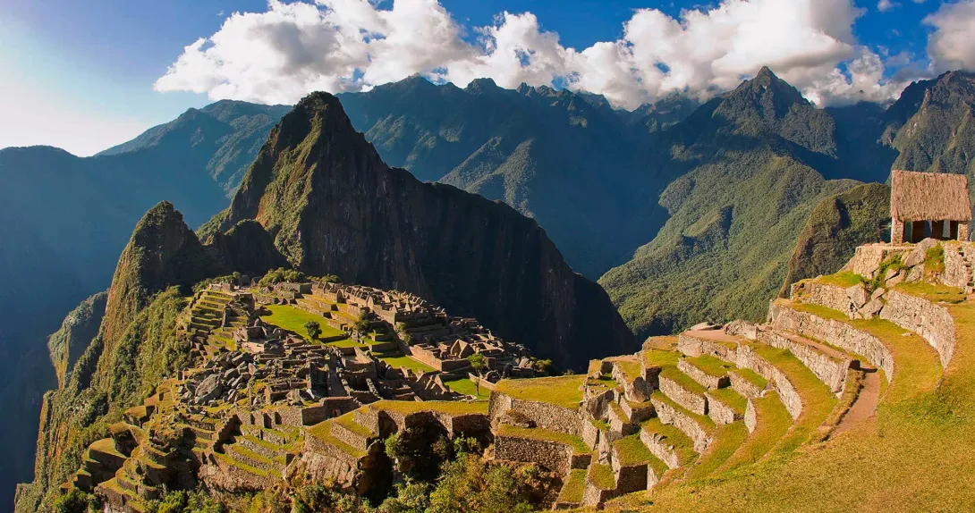 Panoramic view of Machu Picchu with the platforms and the guardian's house - machu picchu luxury tours