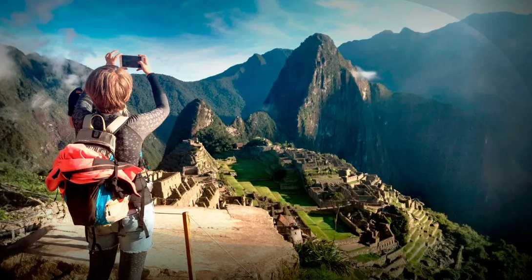 Tourism in Peru - Machu Picchu with a view of the buildings and the surrounding mountains